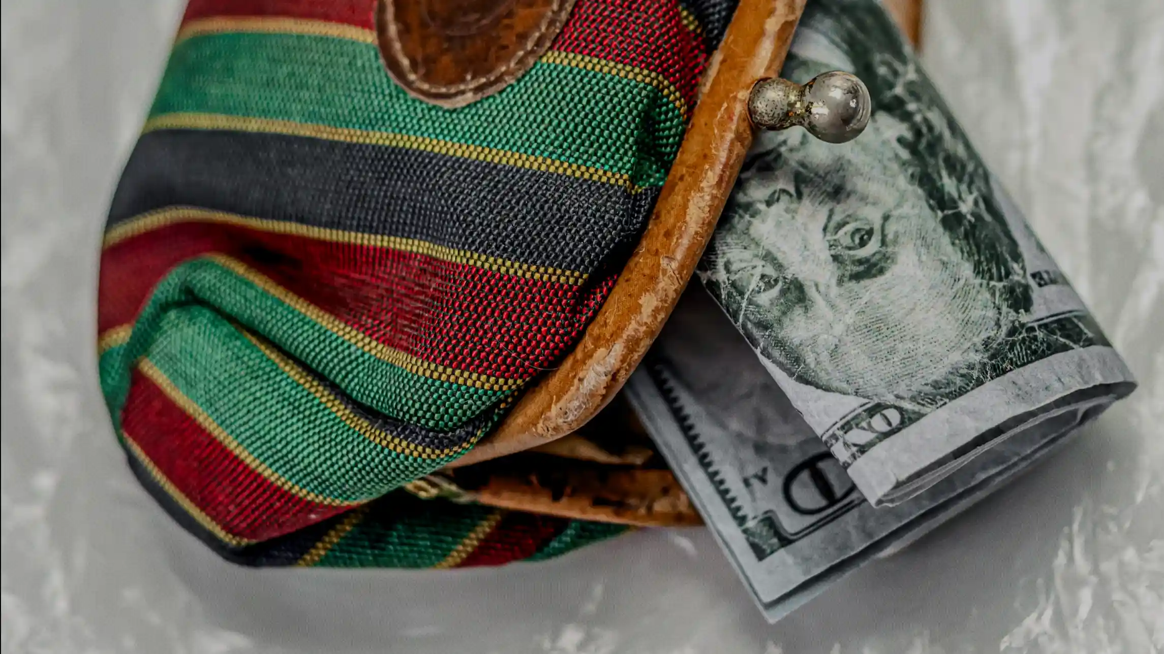 Money in a purse from an evidence bag