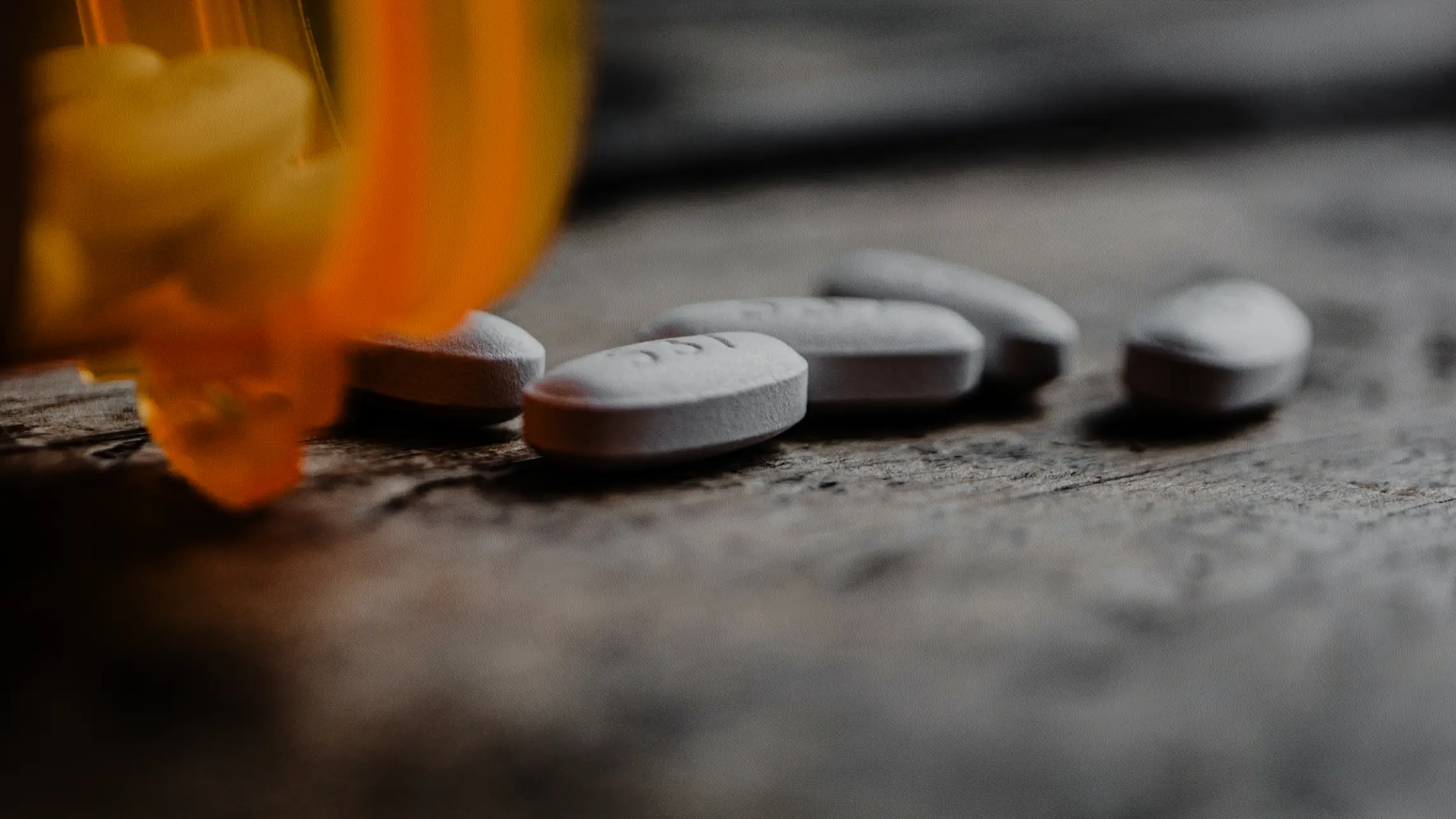 Close-up of prescription pills on table