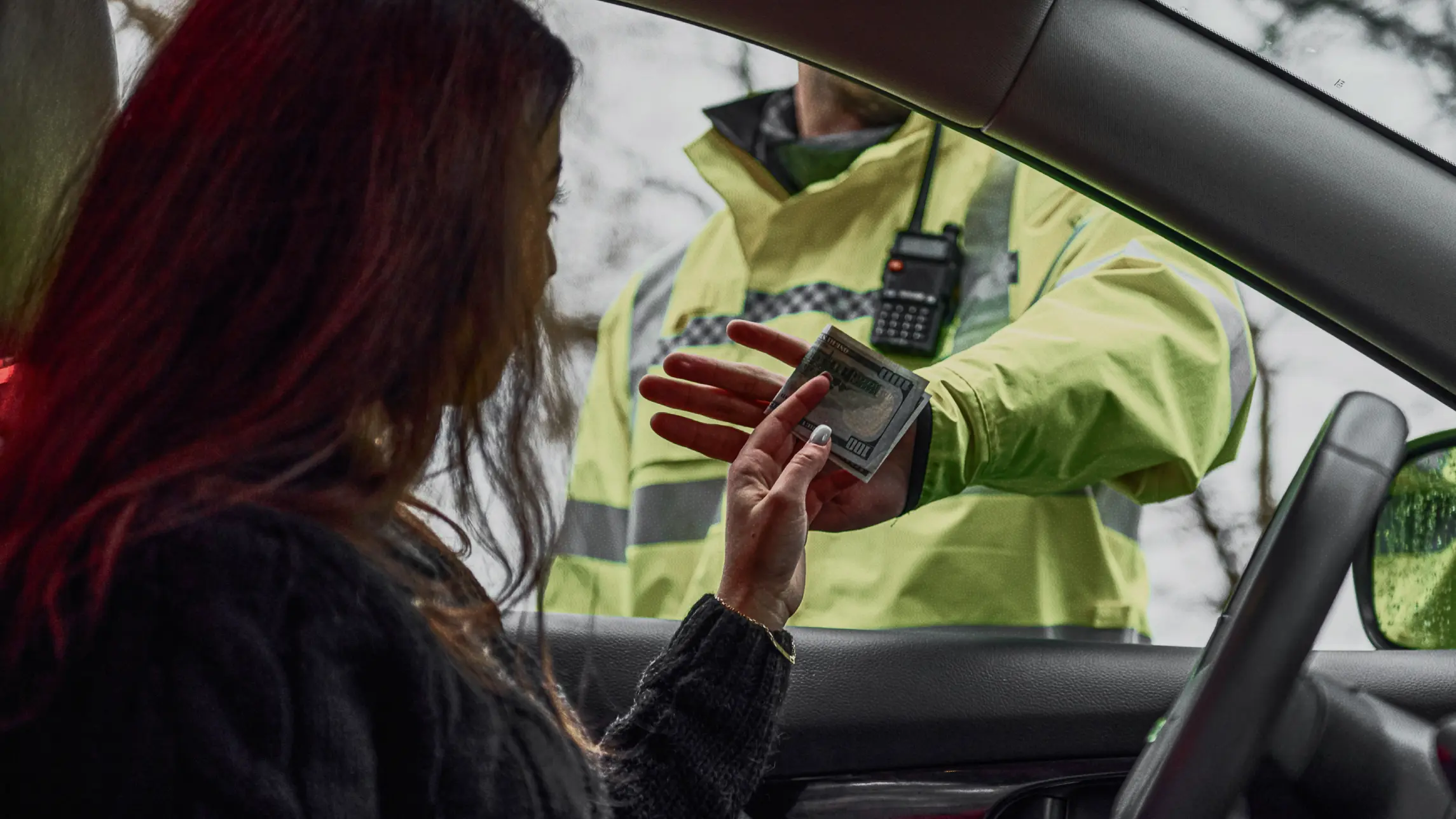 Woman bribing police with money and getting rejected