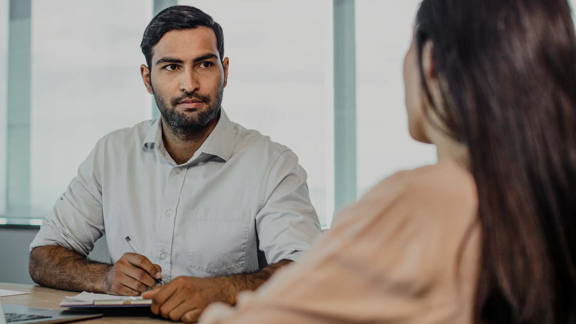Bail agent listening to woman's story