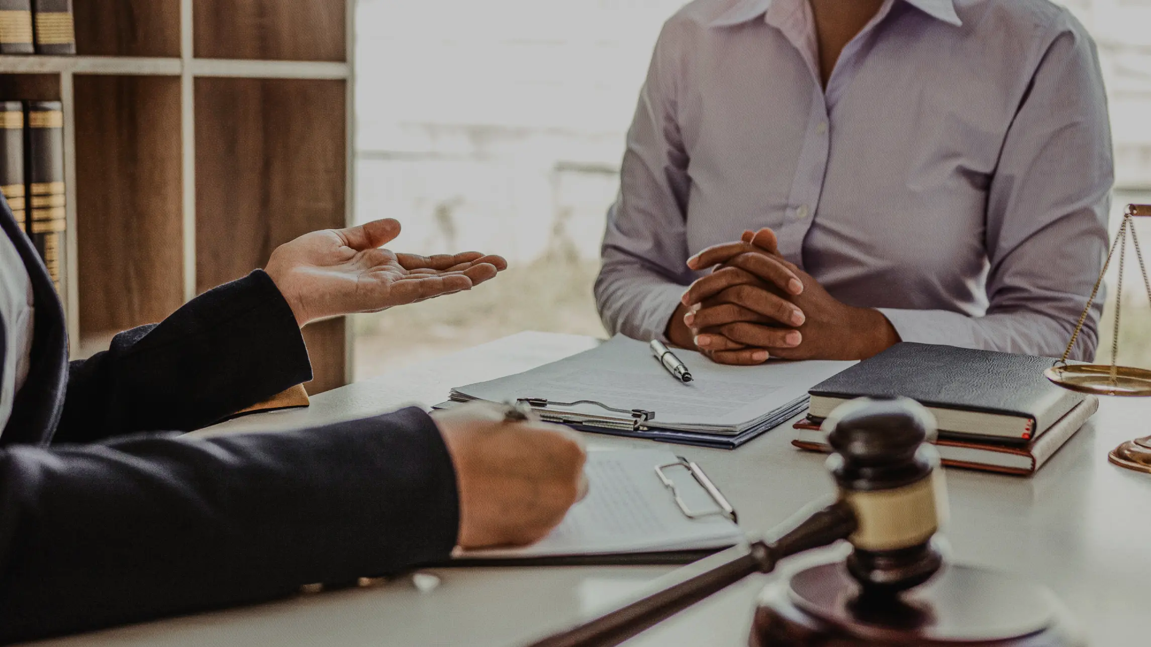 Woman learning how to get a bail bond from bail agent