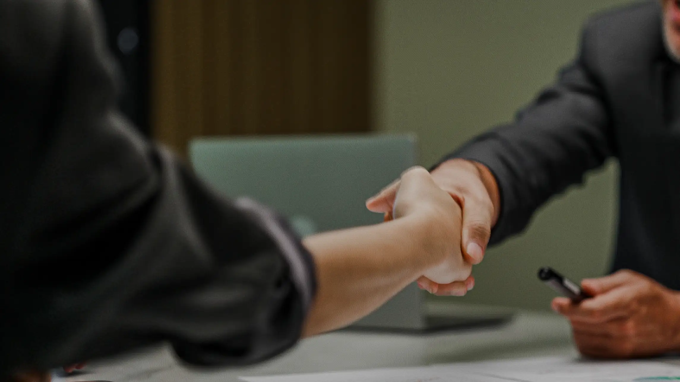 Shaking hands in agreement