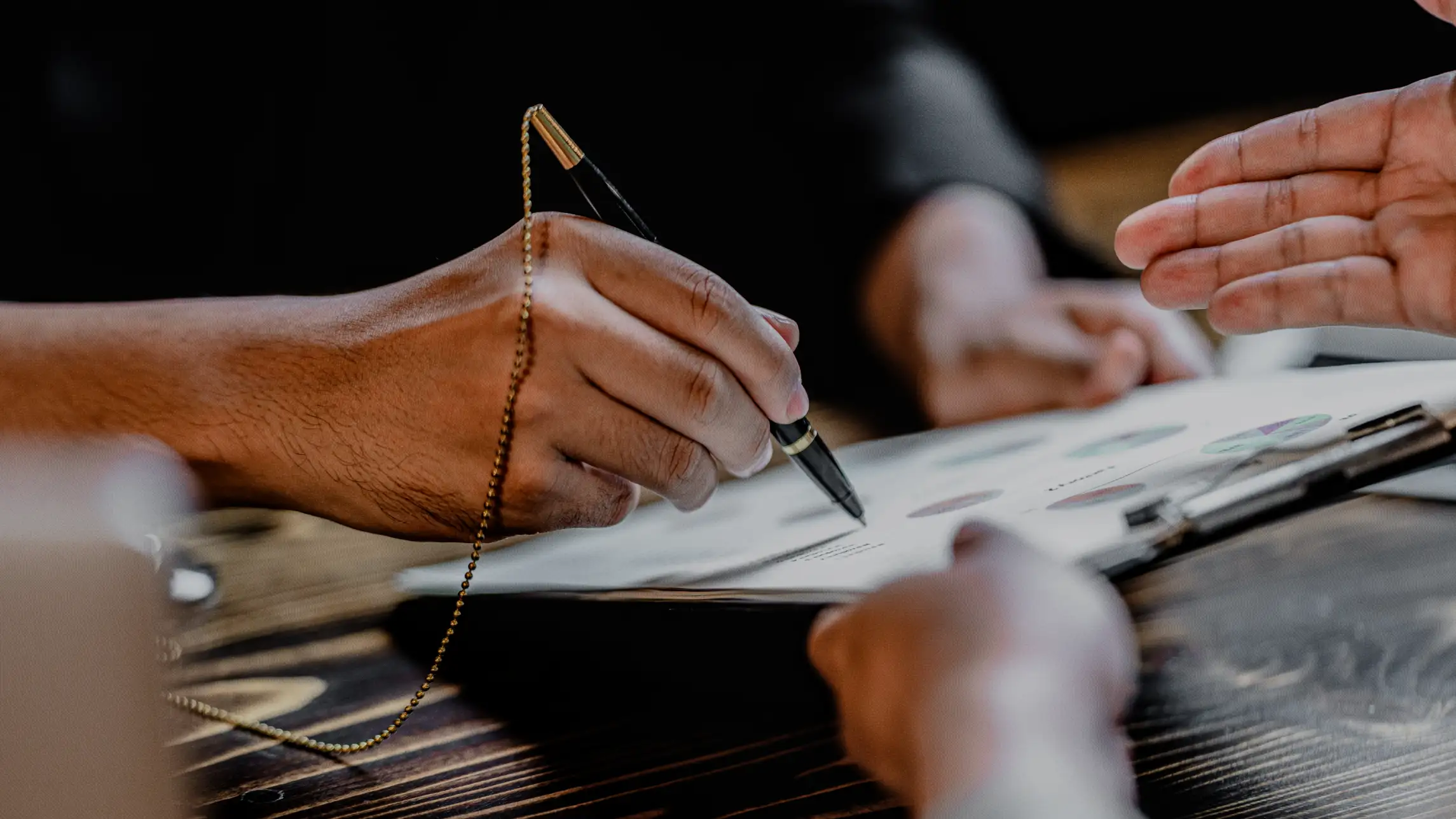 Local bail bond agent assisting with application for bail bond