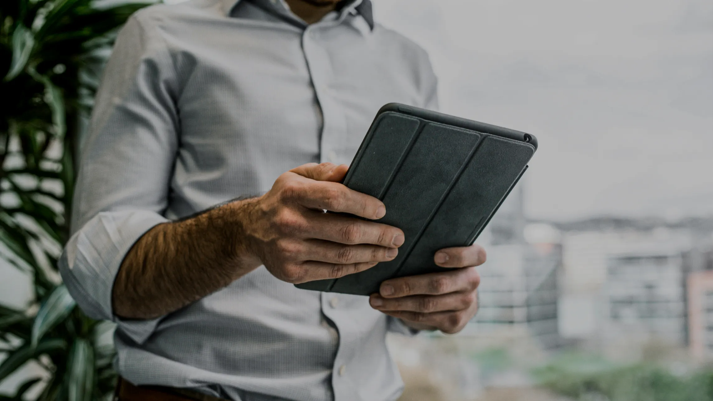 Agent verifying information for bail bond on tablet