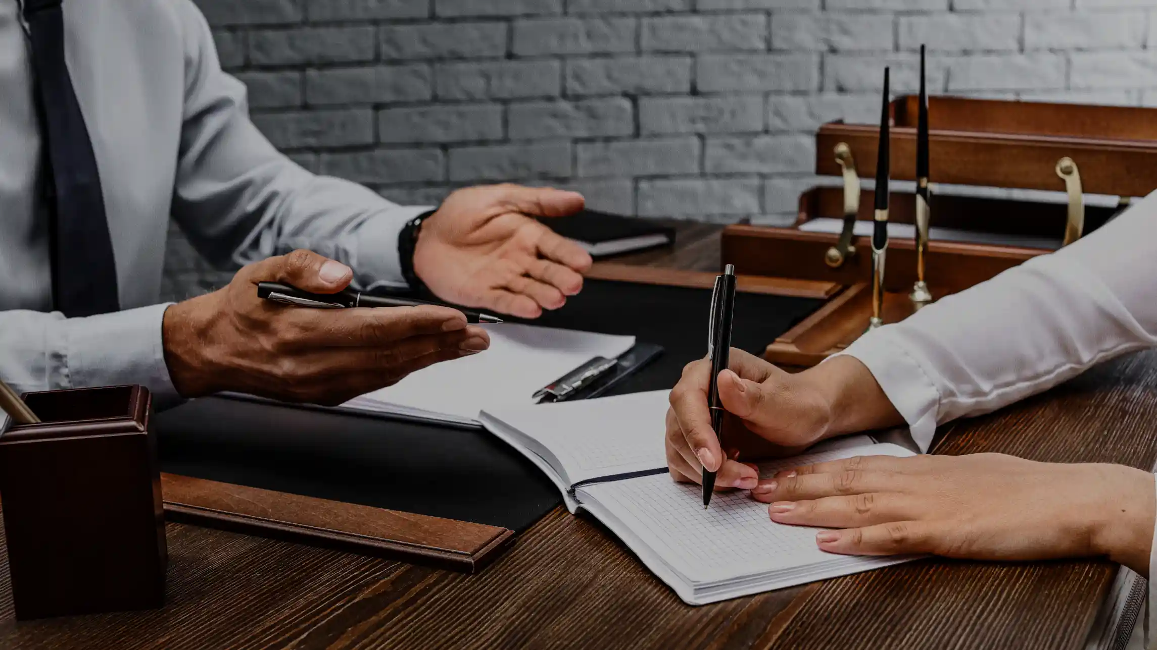 Bail bond agent writing bond in office