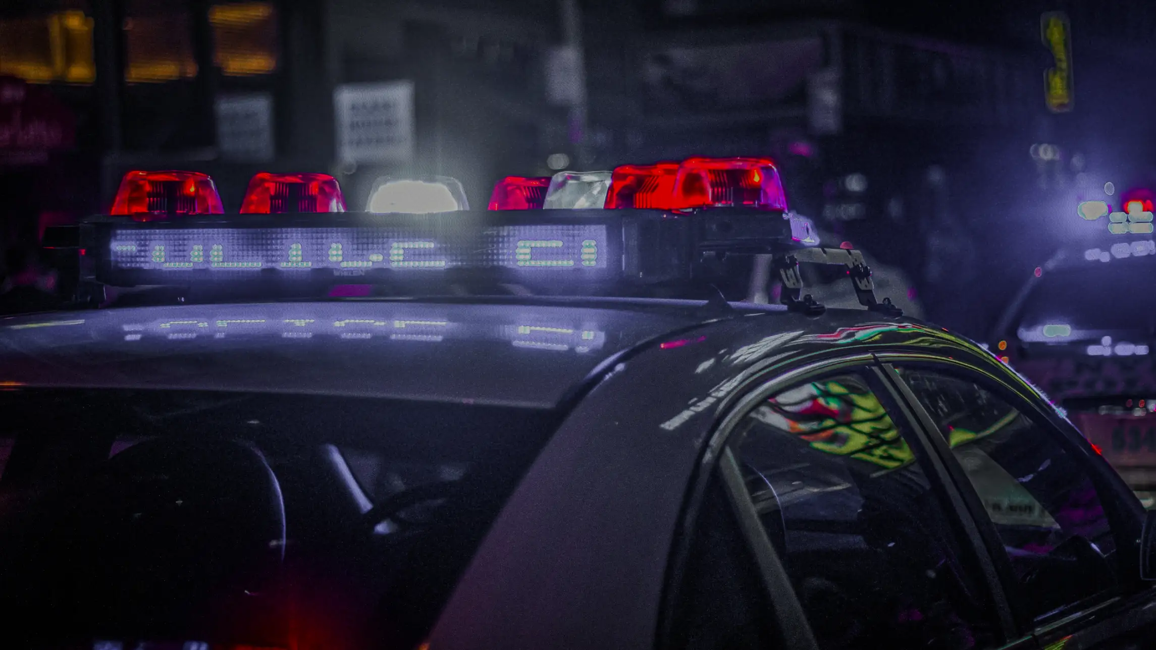 Police car lights at night in the city